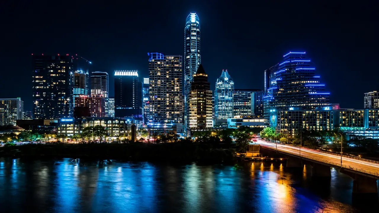 Downtown Austin skyline at night over Lady Bird Lake