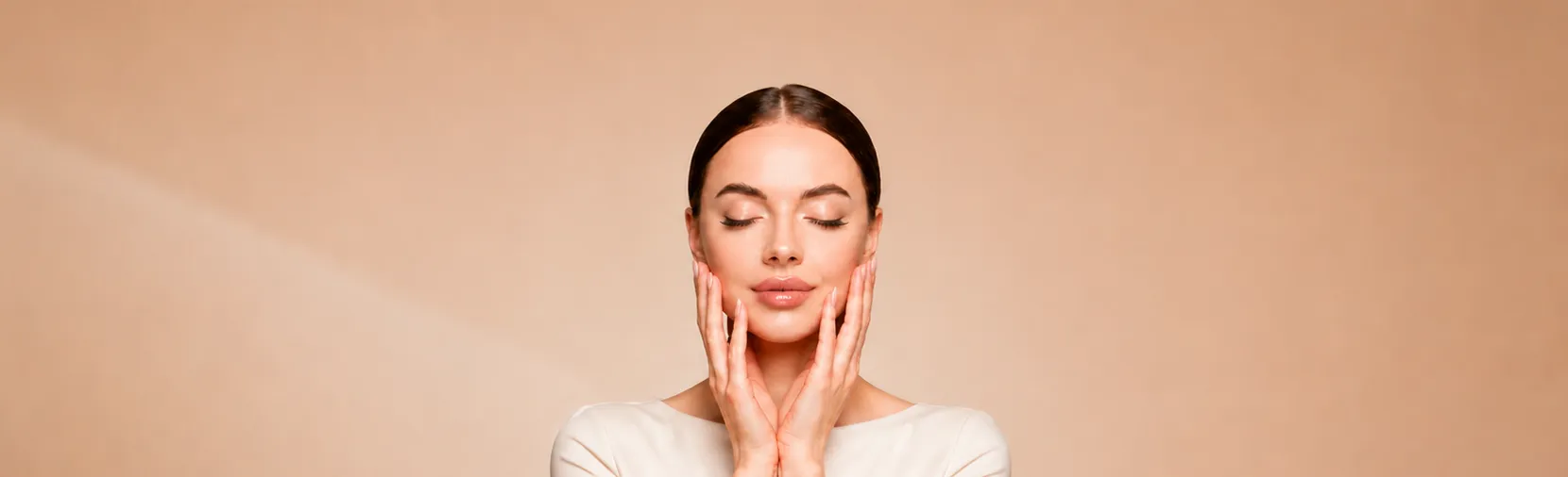A patient with radiant, healthy skin and a confident, natural smile